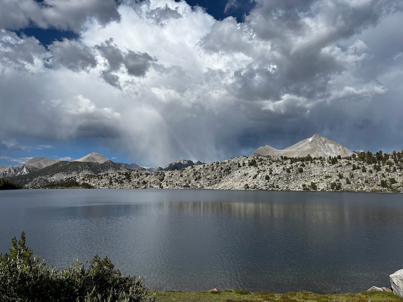 An afternoon storm system beyond Rose Lake.